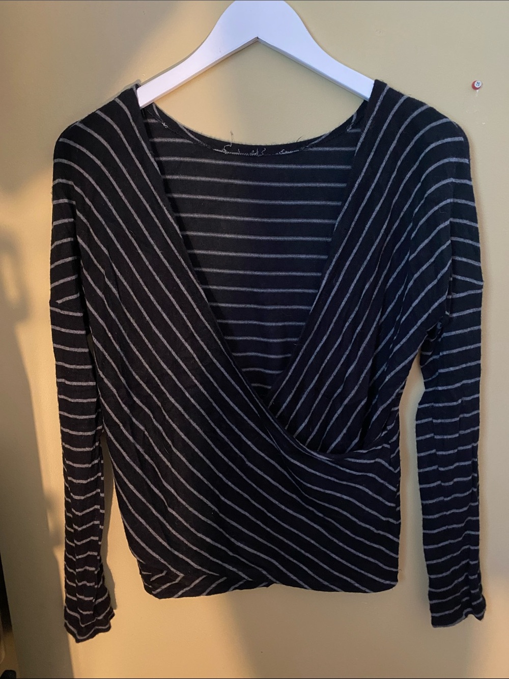 Beyond Yoga Reversible Striped Wrap Long-Sleeve Top in Black and Gray
